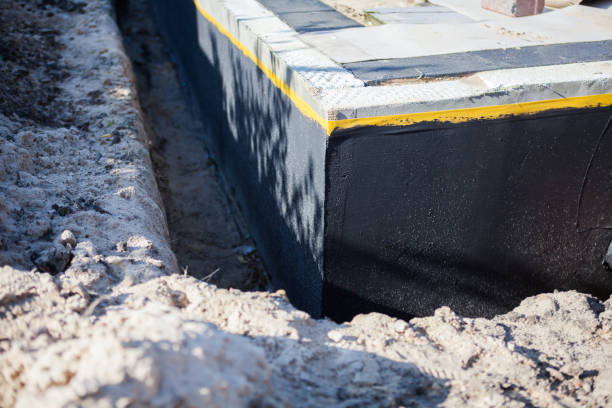 Professional Exterior Waterproofing technician working in Matthews, IN